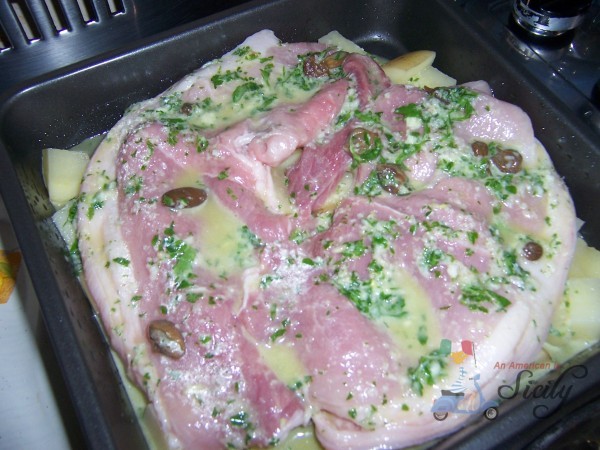 pork chops in wine, garlic, parsley, and lemon.
